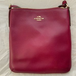 Plum coach crossbody bag